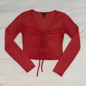 Burnt orange long sleeve cropped top